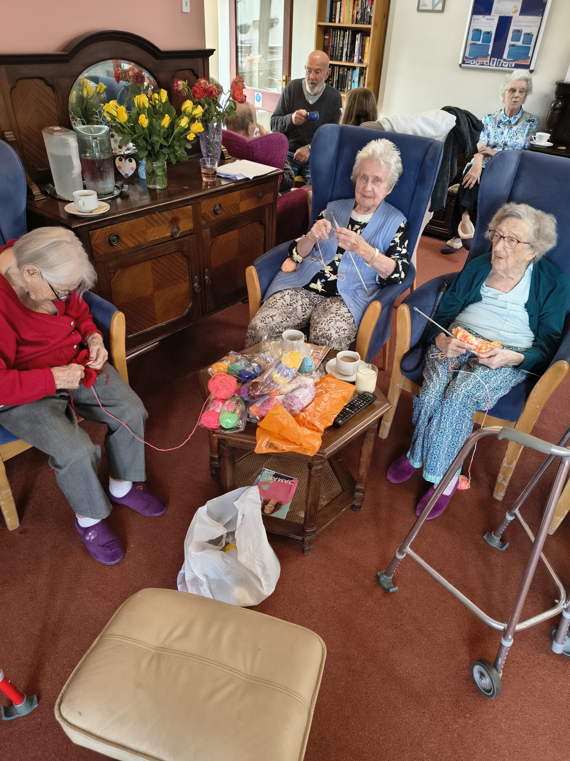 3 residents knitting scaled