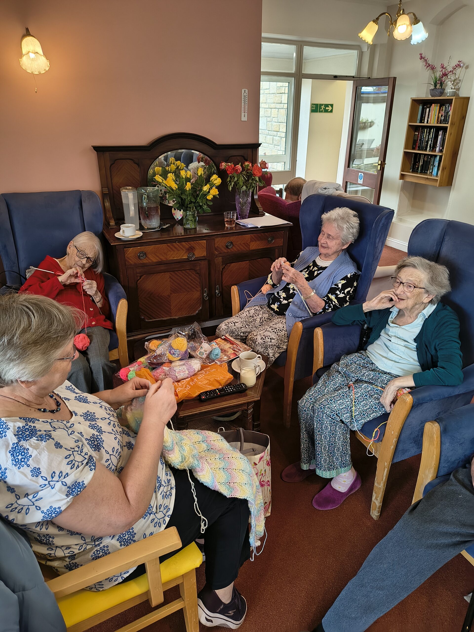 4 residents sat around the table of wool scaled