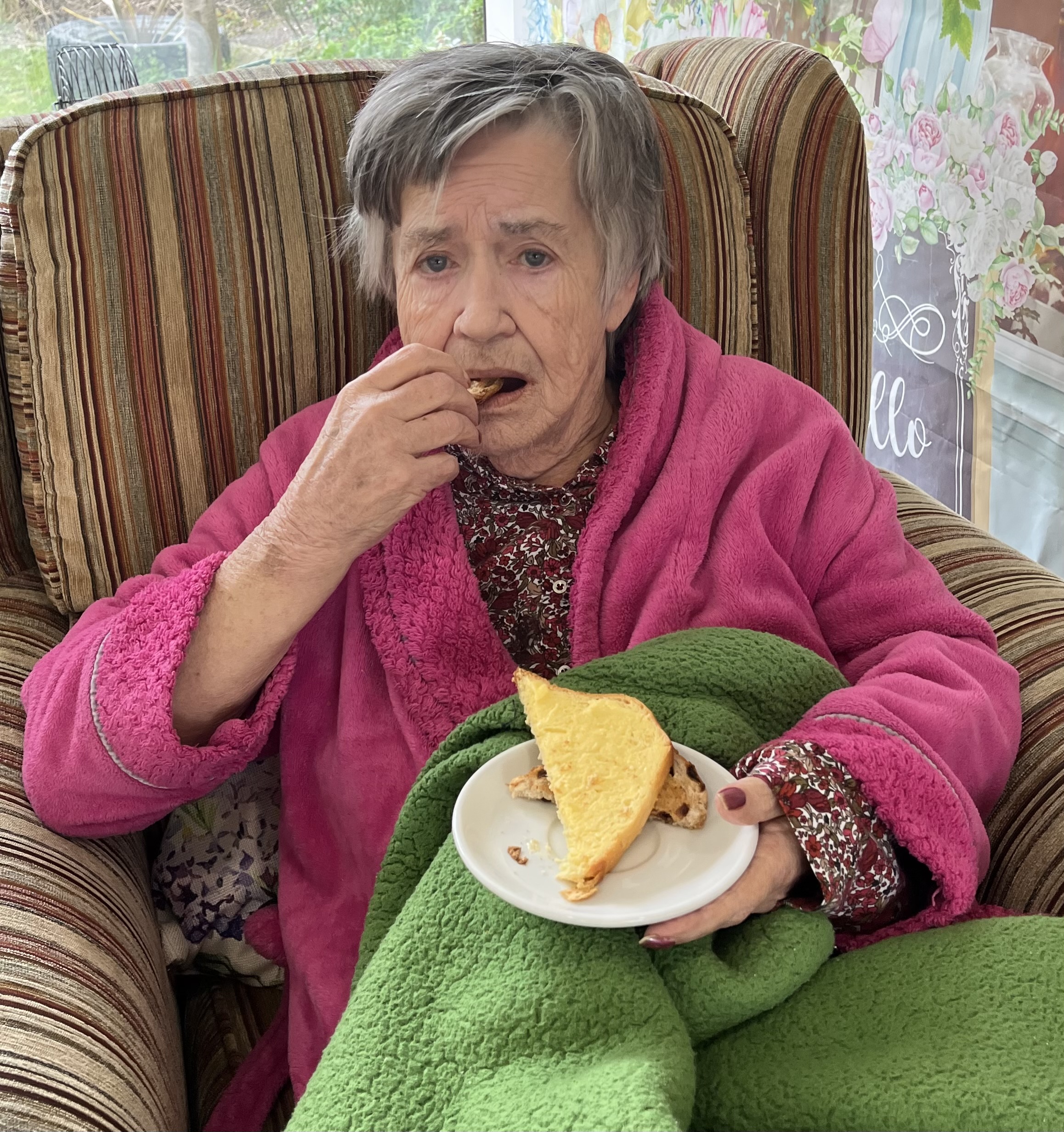 Residents enjoying a slice of sweet loaf and a cup of tea 2