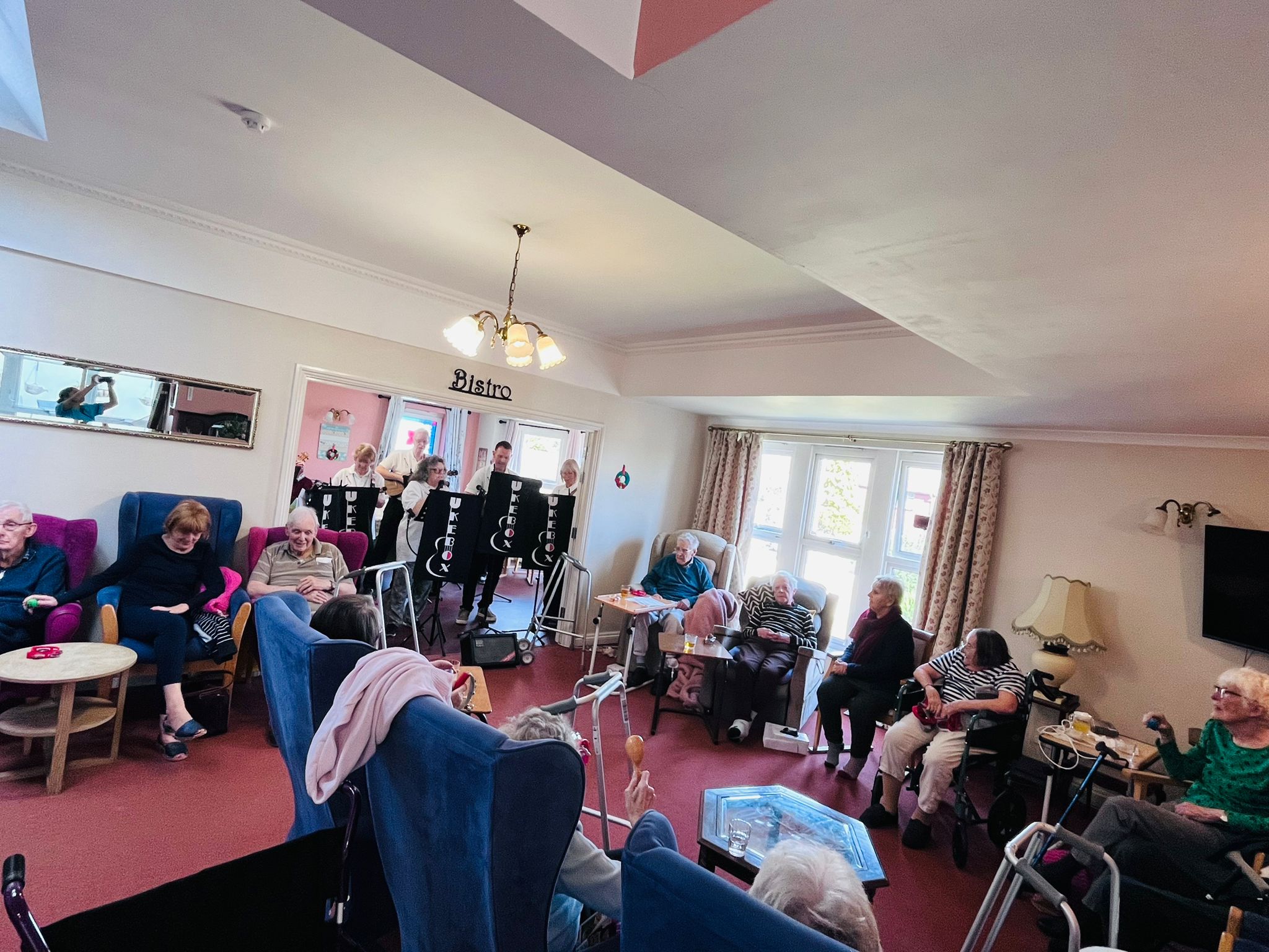 Residents listening to the ukulele band 1