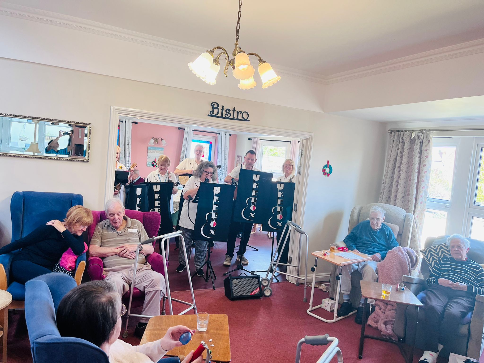 Residents listening to the ukulele band 2