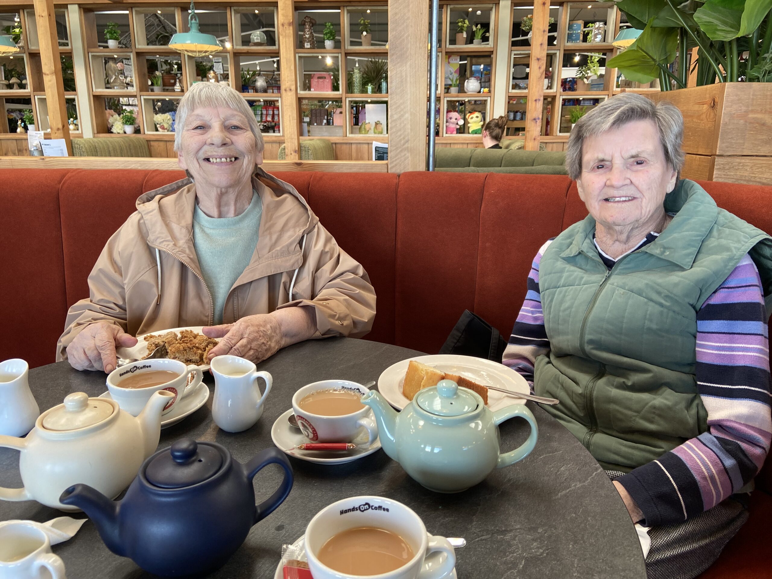 Ange Marj at Homeleigh Garden Centre having tea and cake scaled