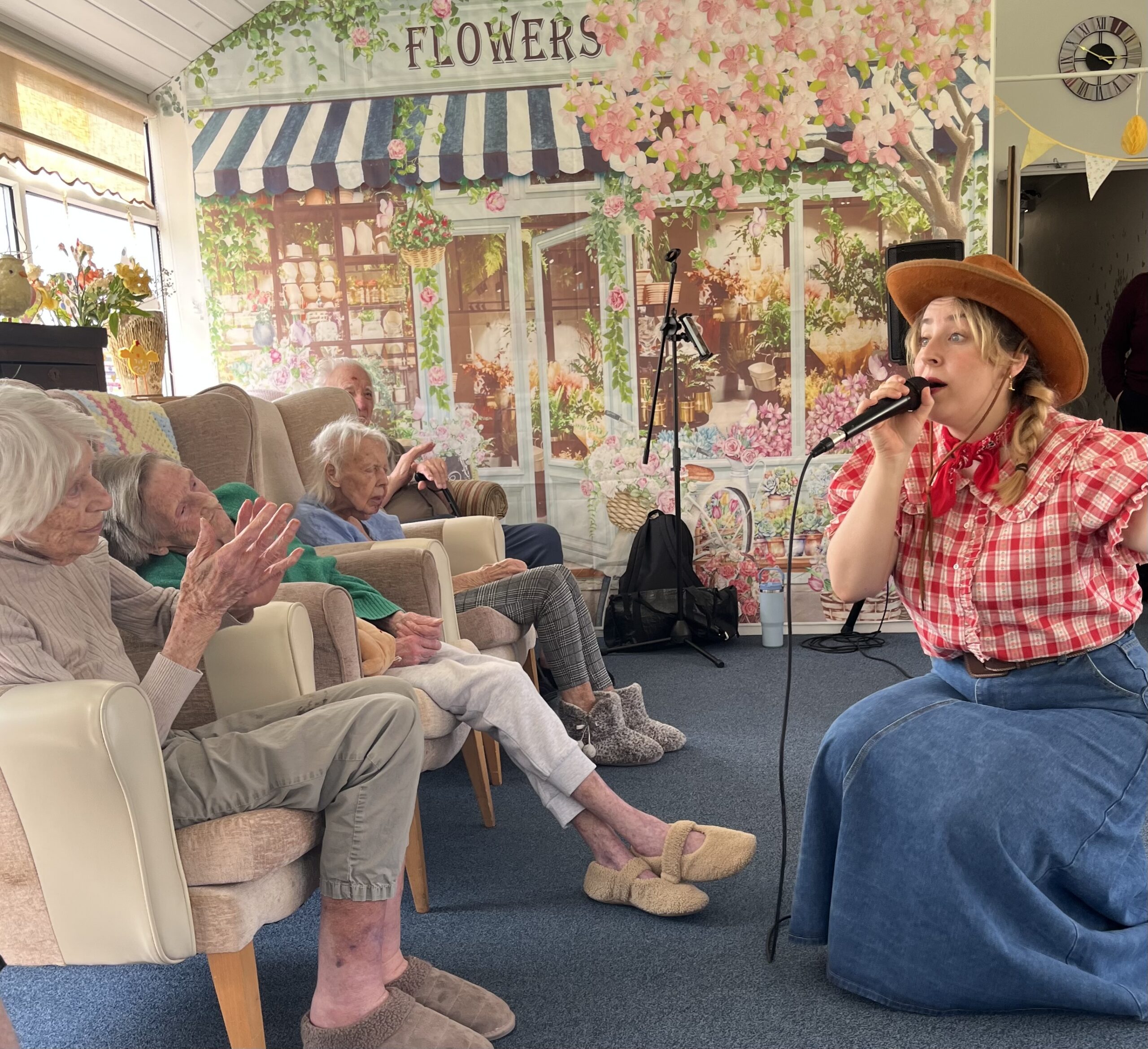Dolly singing to the residents scaled