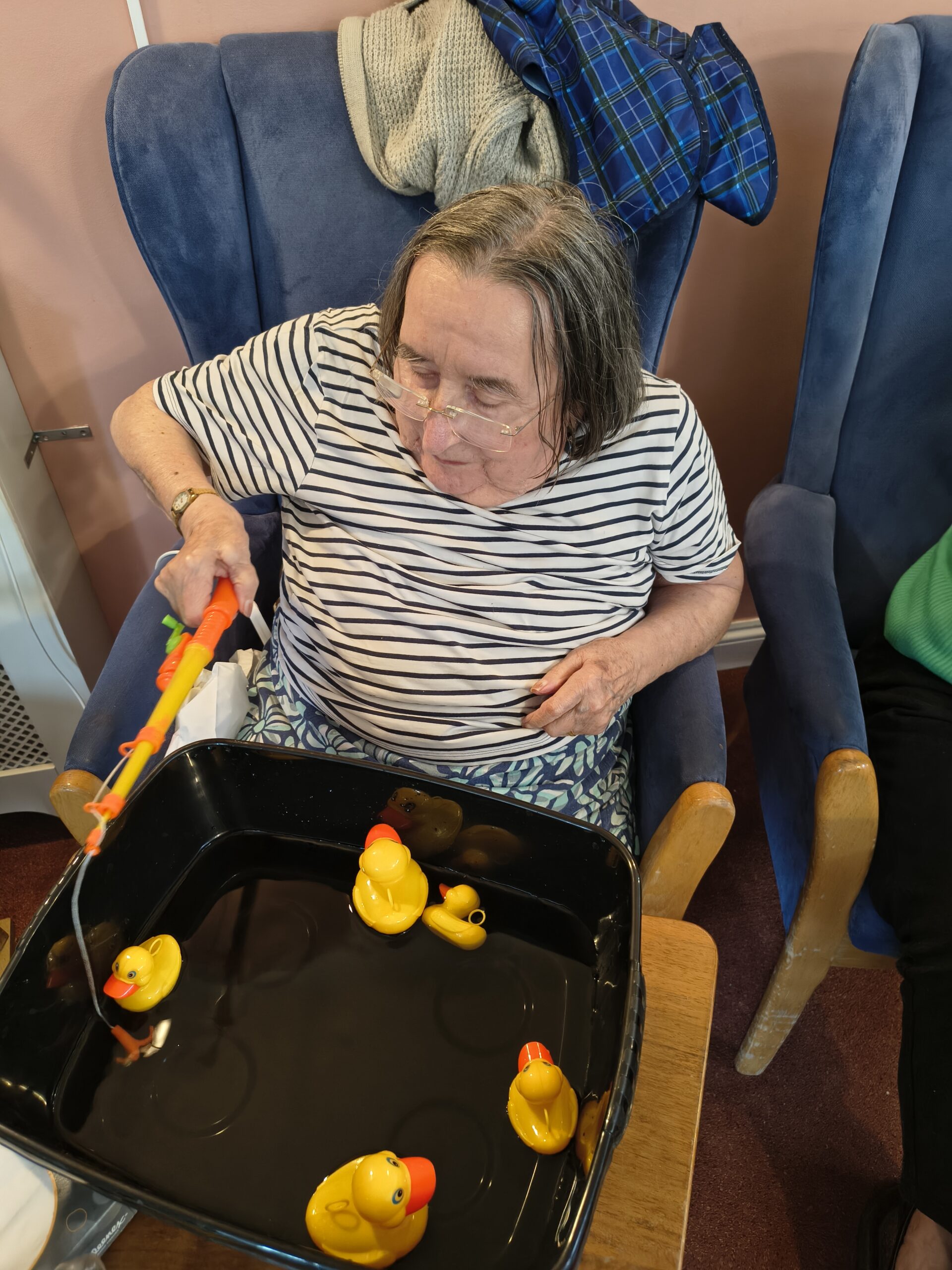 Female resident hooking a duck but missing scaled