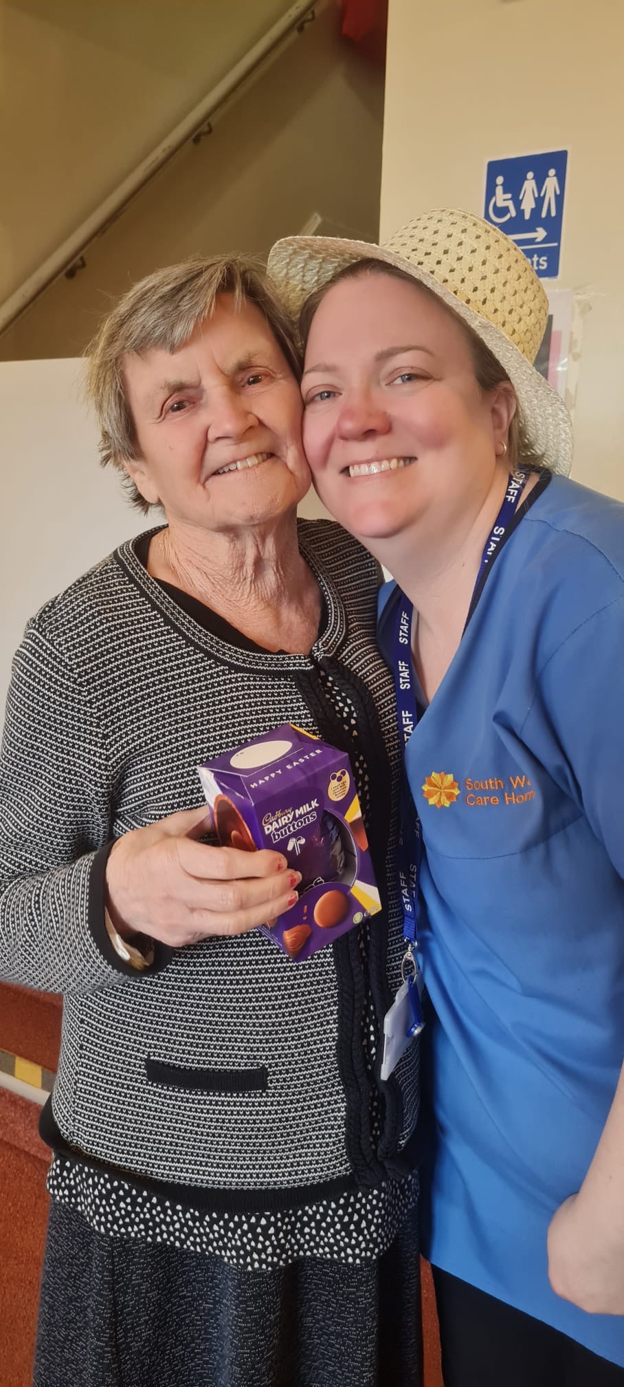 Marj holding a chocolate egg with Sarah
