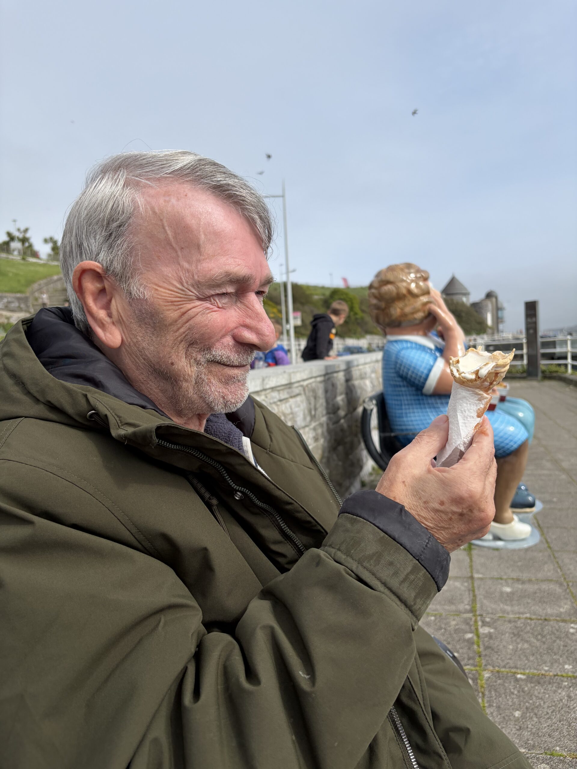 Martin admiring his ice cream already half way through it scaled