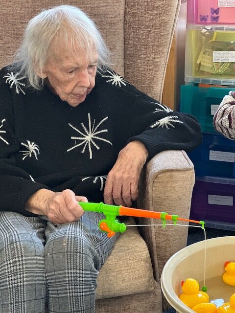 Mary trying to hook a duck rotated