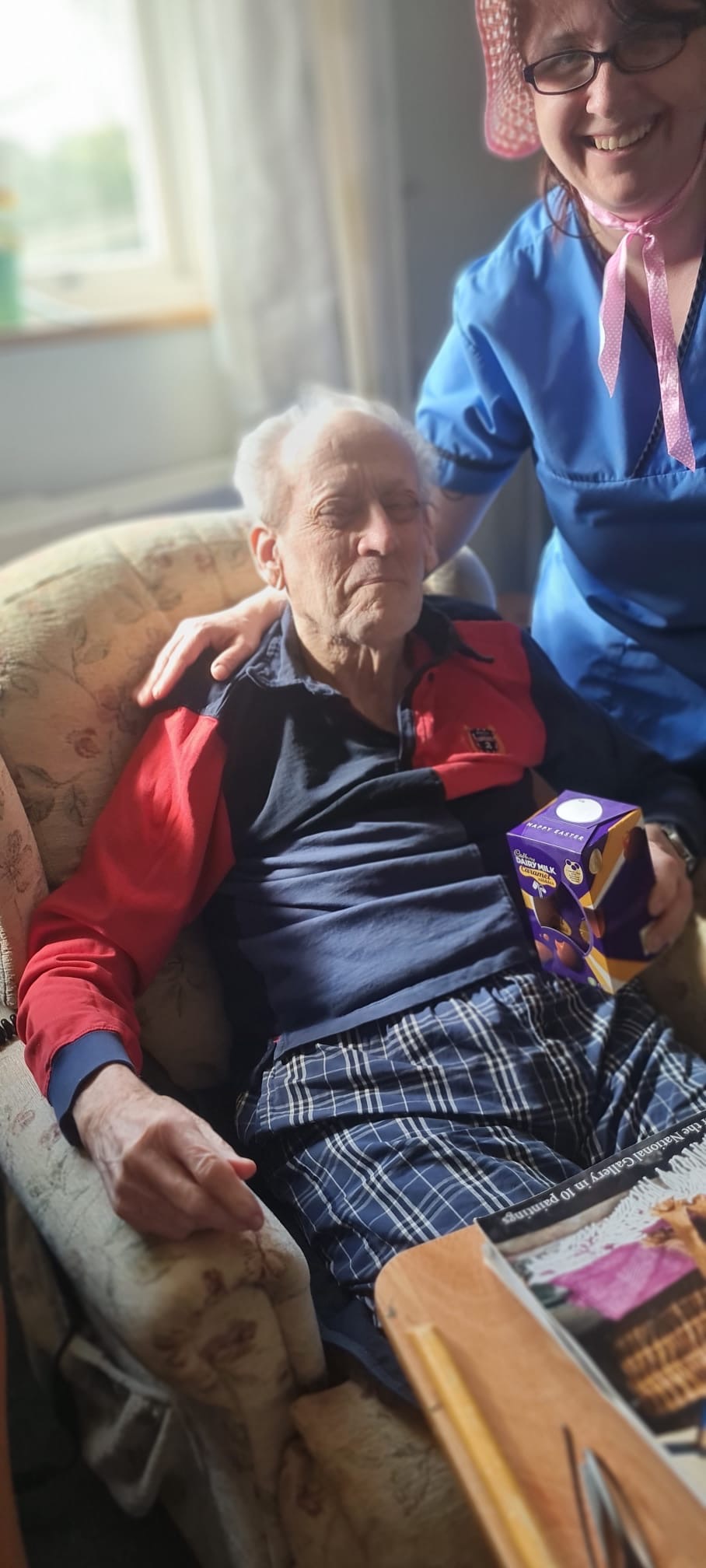Tim holding a chocolate egg with Paula
