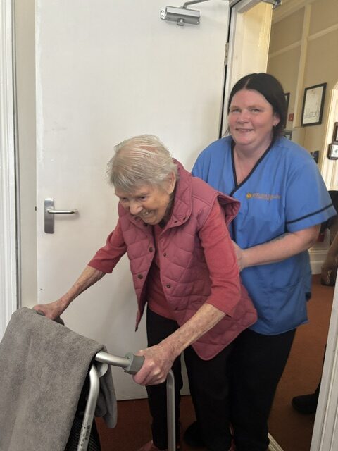 Anne having a dance with a carer for support rotated