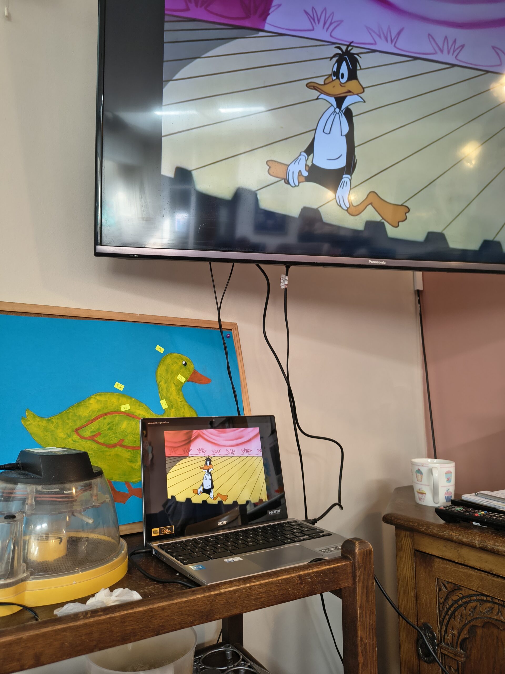 Daffy Duck cartoon on the screen scaled