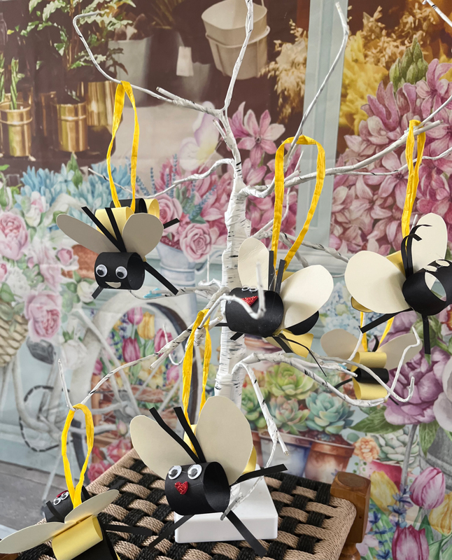 Display of the bees hanging on a decorative tree