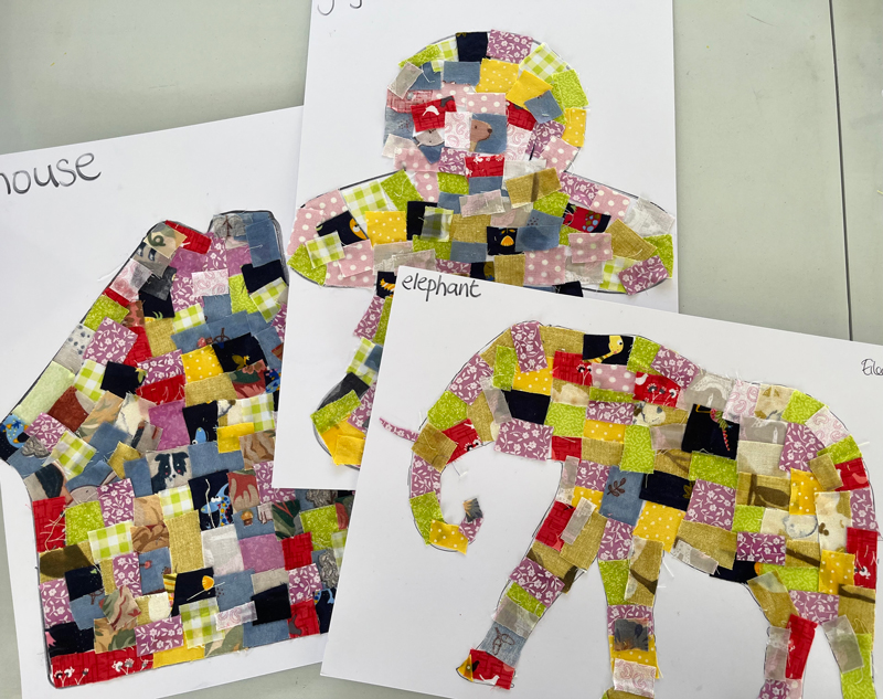 Finished paper patchworks of a house an elephant and a gingerbread man