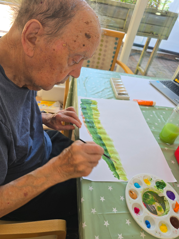 Horace painting green hills and fields