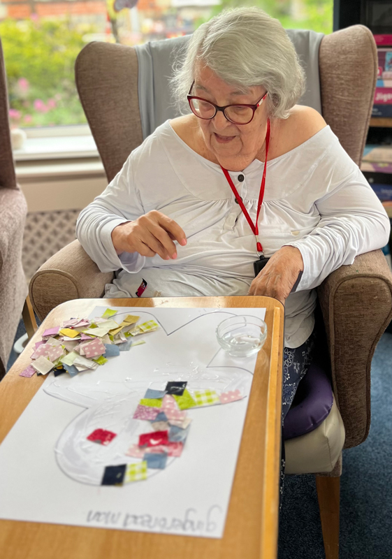Maggie working on her gingerbread man patchwork