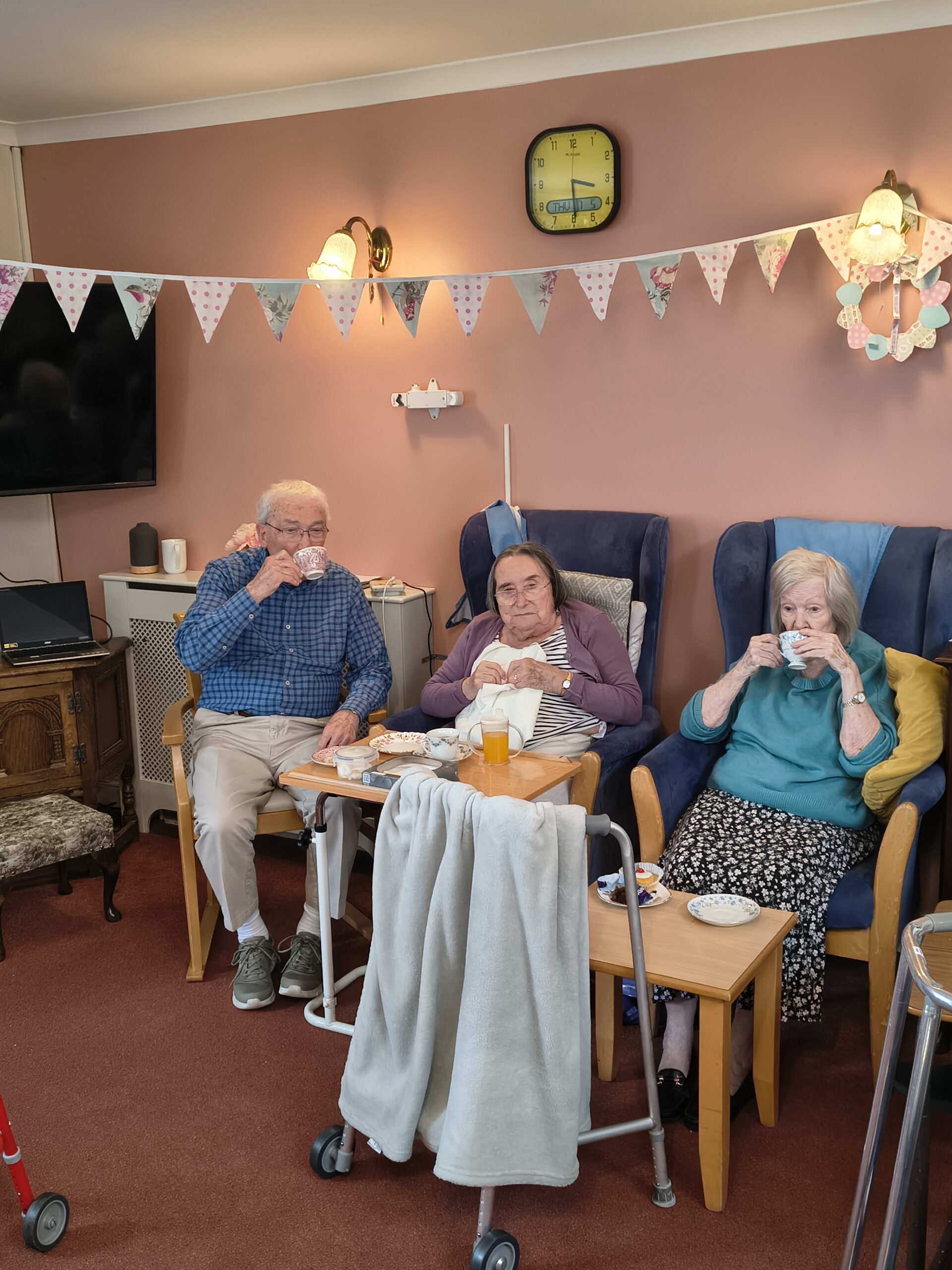 Residents drinking tea from pretty cups and saucers scaled
