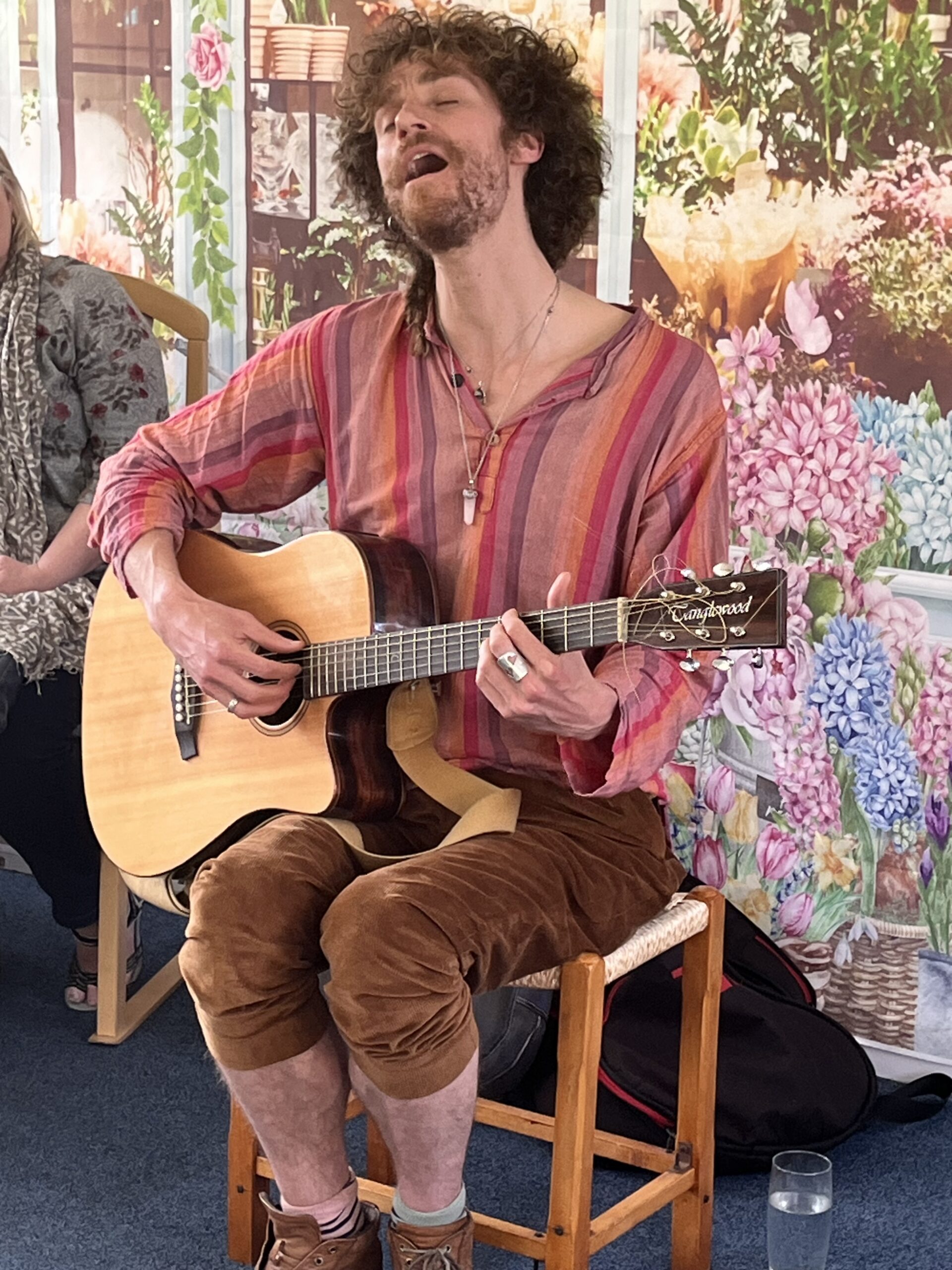 Roddy singing and playing the guitar scaled